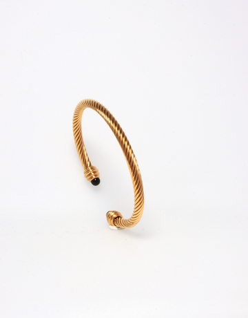 GOLD BANGLE WITH BLACK STONES